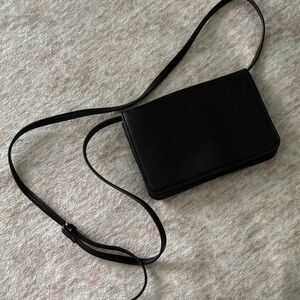 a new day Black Crossbody Bag
